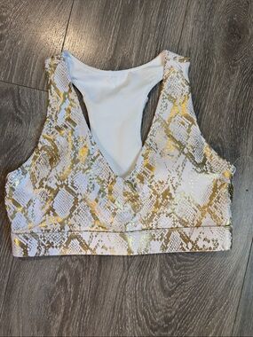 Fabletics Copper snake skin medium support sports bra size medium